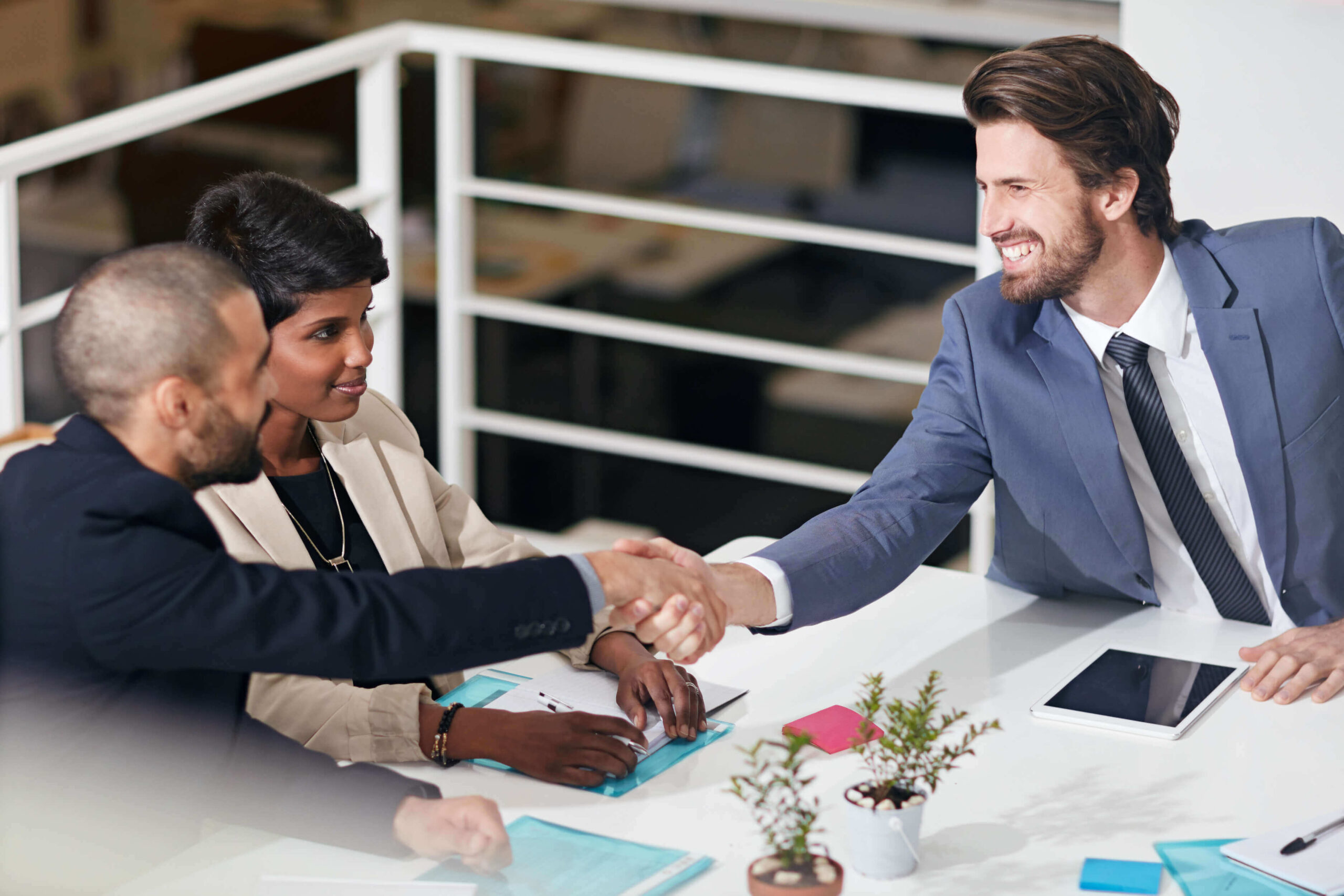 creating business partnerships shot businesspeople shaking hands office meeting 1 1 scaled